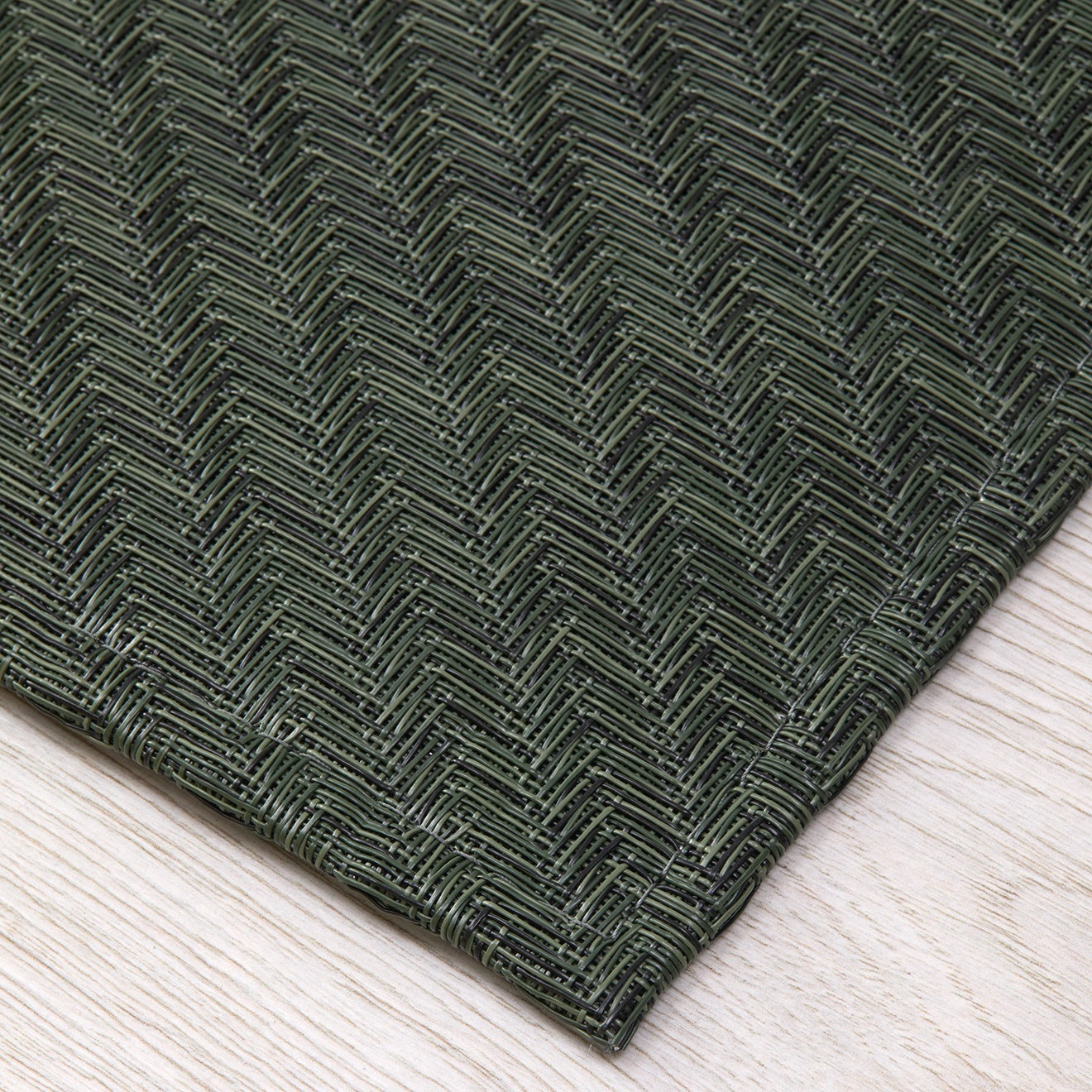 Chilewich woven floor mat in neutral woven terrastrand yarn, durable and stylish for modern living spaces.