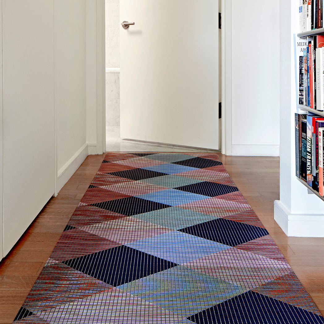 Chilewich woven floor mat in neutral woven terrastrand yarn, durable and stylish for modern living spaces.