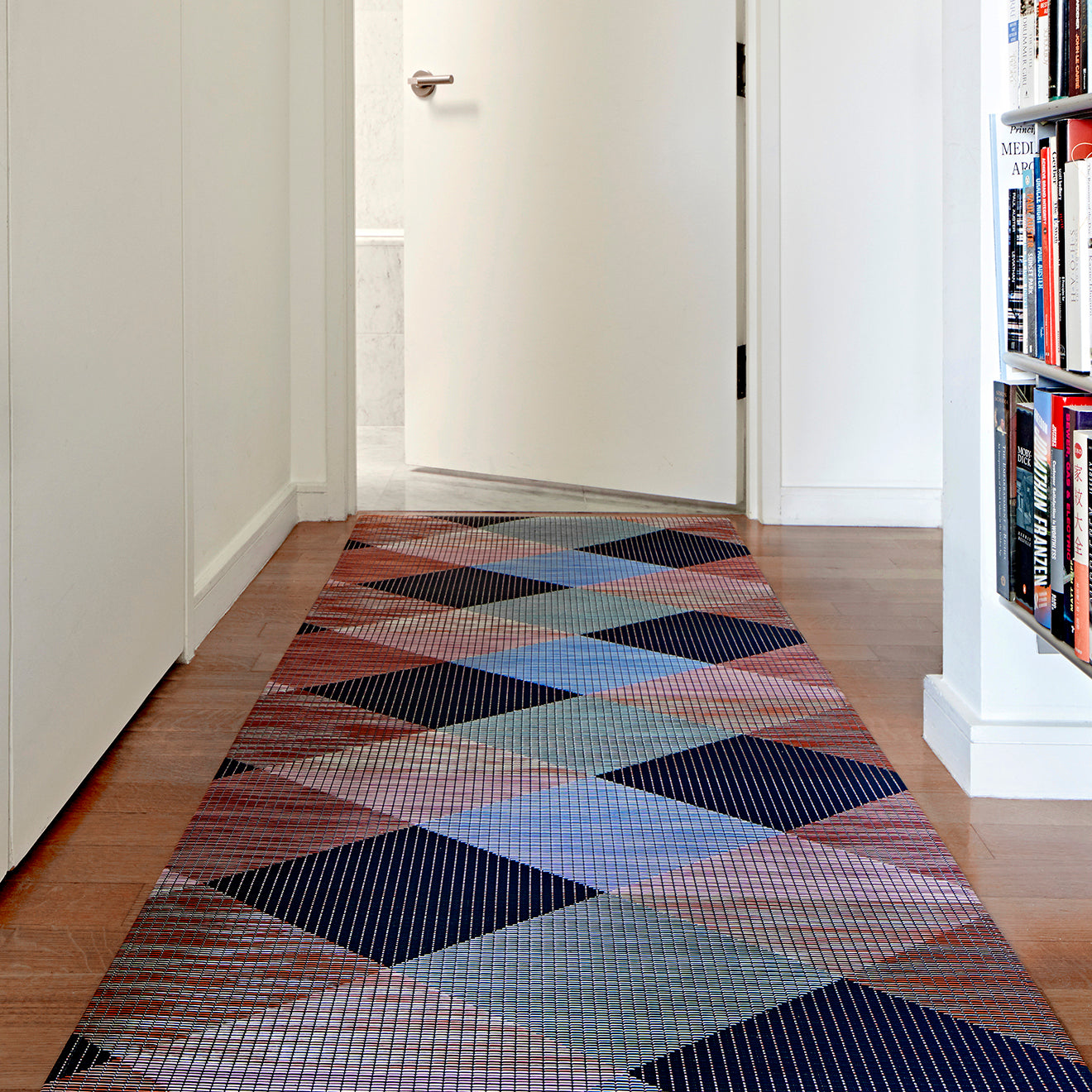 Chilewich woven floor mat in neutral woven terrastrand yarn, durable and stylish for modern living spaces.