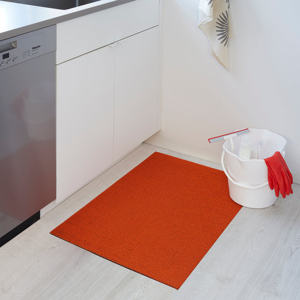 Chilewich woven floor mat in neutral woven terrastrand yarn, durable and stylish for modern living spaces.