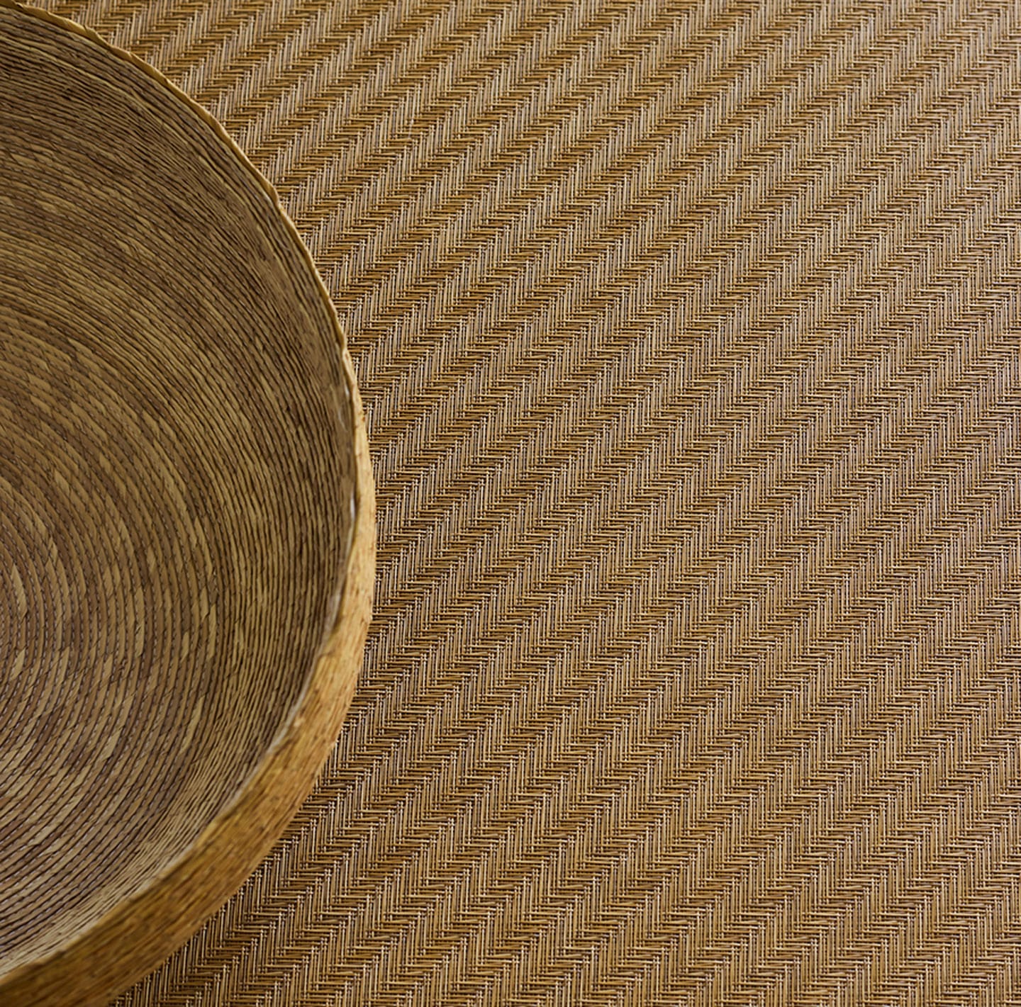 Detail image of Chilewich woven material showcasing texture, color, and pattern of the terrastrand yarn weave.