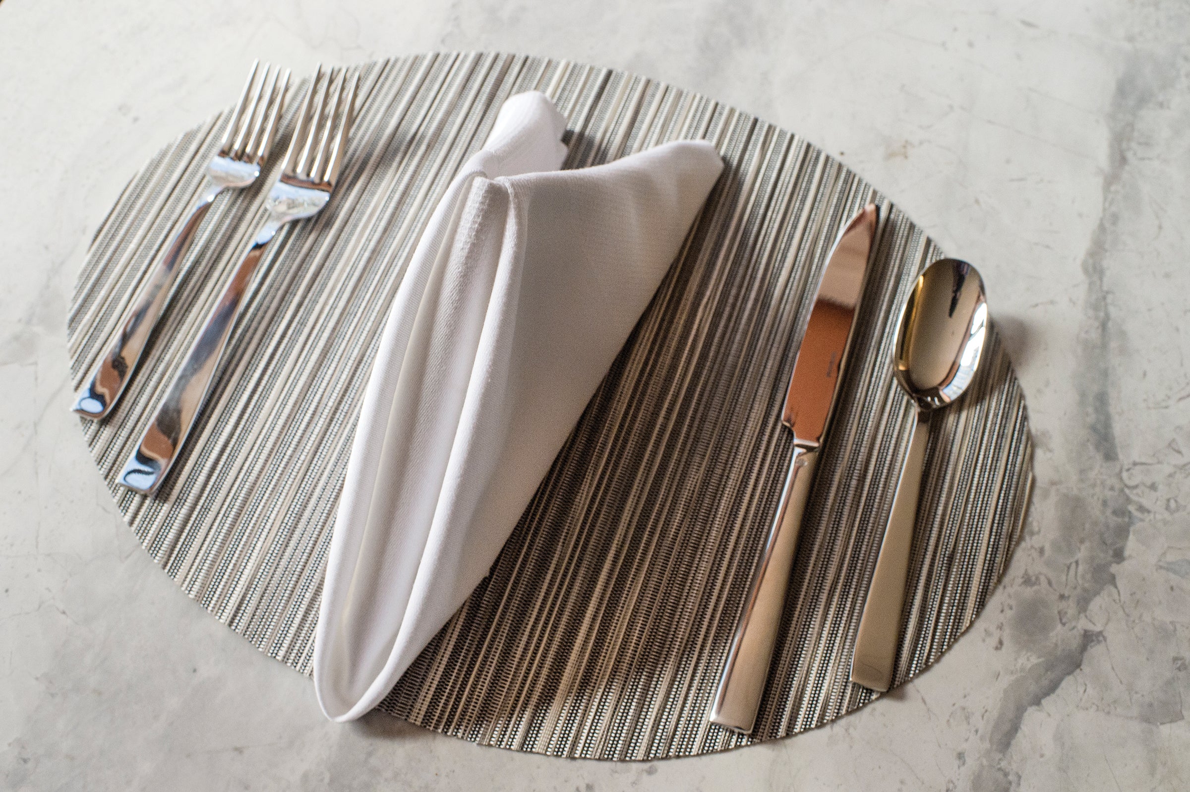 Detail image of Chilewich woven material showcasing texture, color, and pattern of the terrastrand yarn weave.