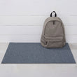 Chilewich woven floor mat in neutral woven terrastrand yarn, durable and stylish for modern living spaces.