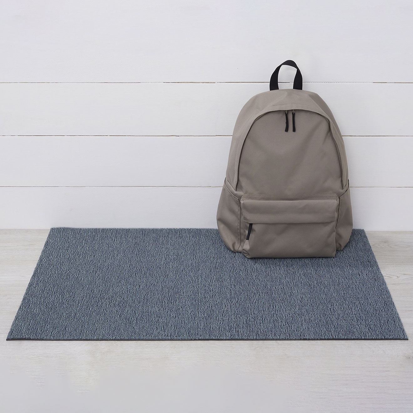 Chilewich woven floor mat in neutral woven terrastrand yarn, durable and stylish for modern living spaces.