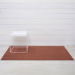 Chilewich woven floor mat in neutral woven terrastrand yarn, durable and stylish for modern living spaces.