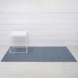Chilewich woven floor mat in neutral woven terrastrand yarn, durable and stylish for modern living spaces.