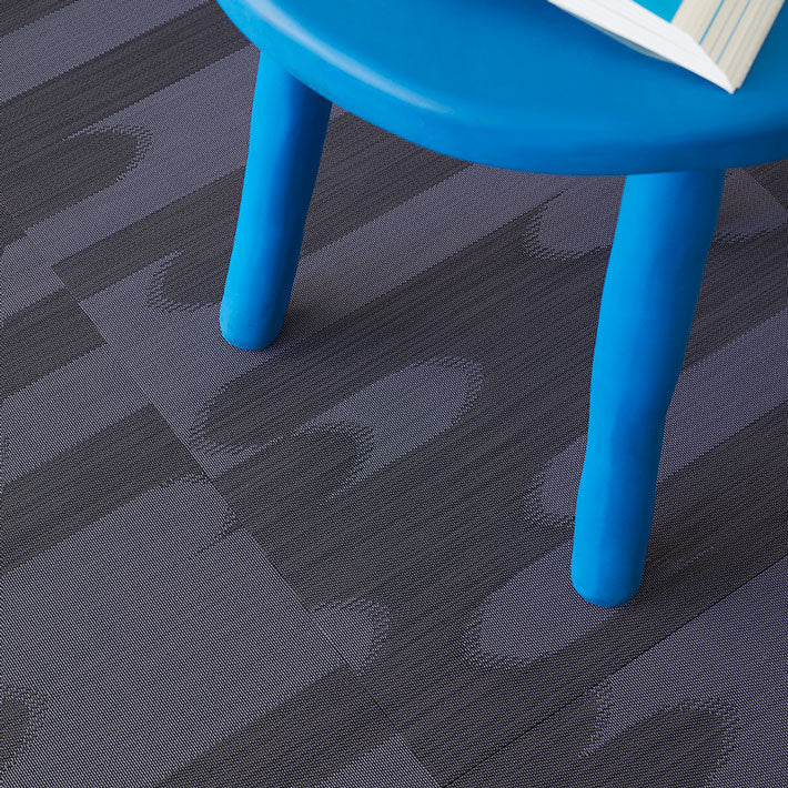 Chilewich woven floor mat in neutral woven terrastrand yarn, durable and stylish for modern living spaces.