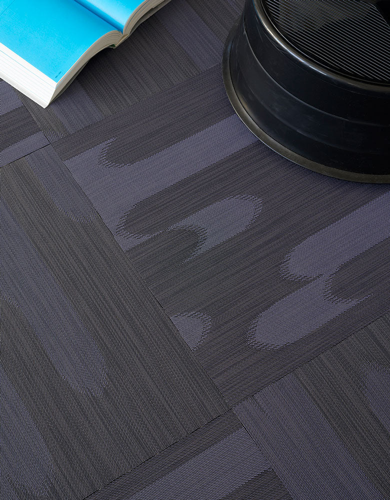 Chilewich woven floor mat in neutral woven terrastrand yarn, durable and stylish for modern living spaces.