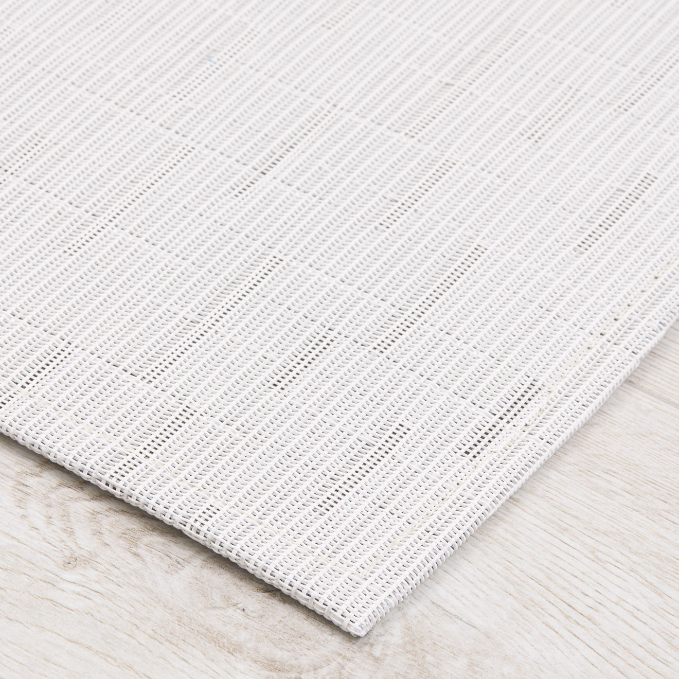 Detail image of Chilewich woven material showcasing texture, color, and pattern of the terrastrand yarn weave.