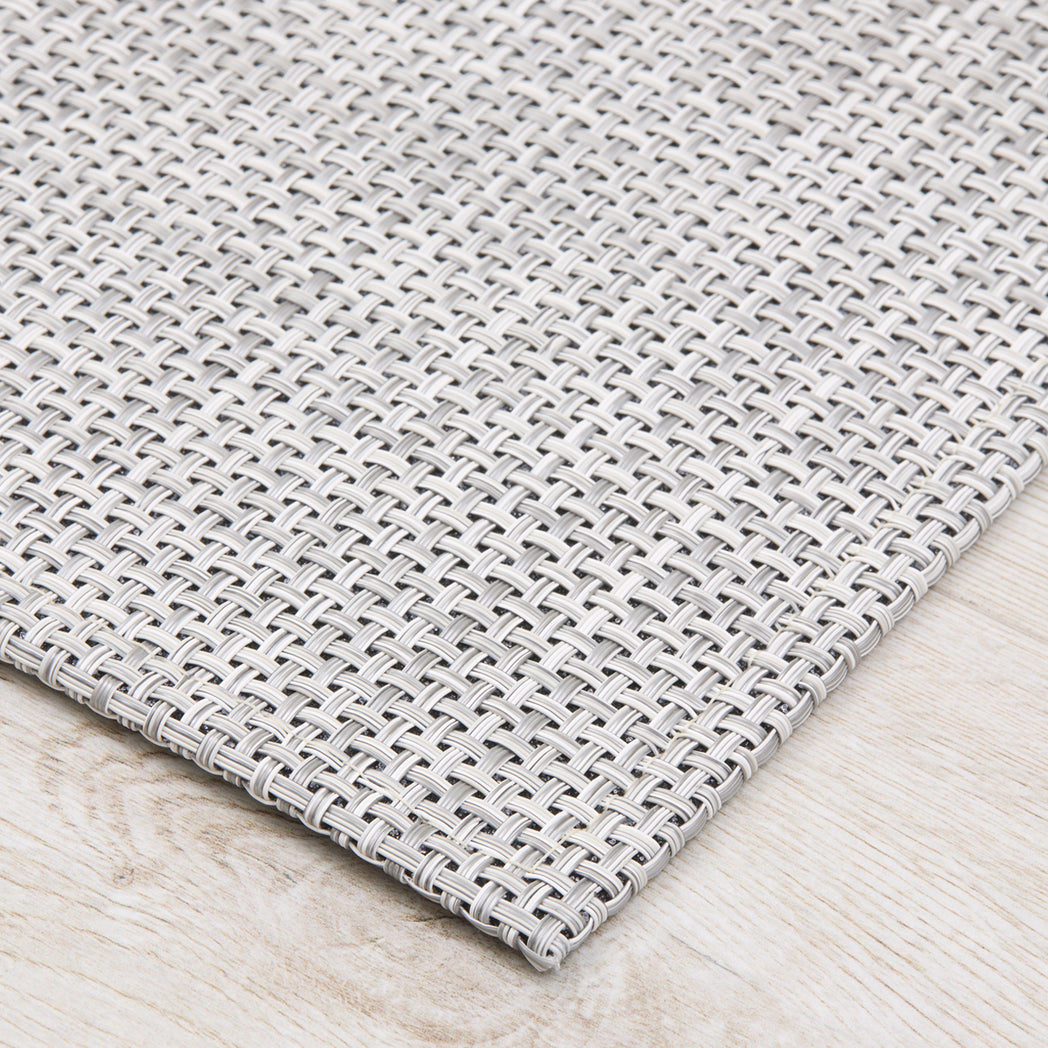 Chilewich Basketweave floor mat in marble, showcasing woven terrastrand yarn texture and modern design aesthetic.