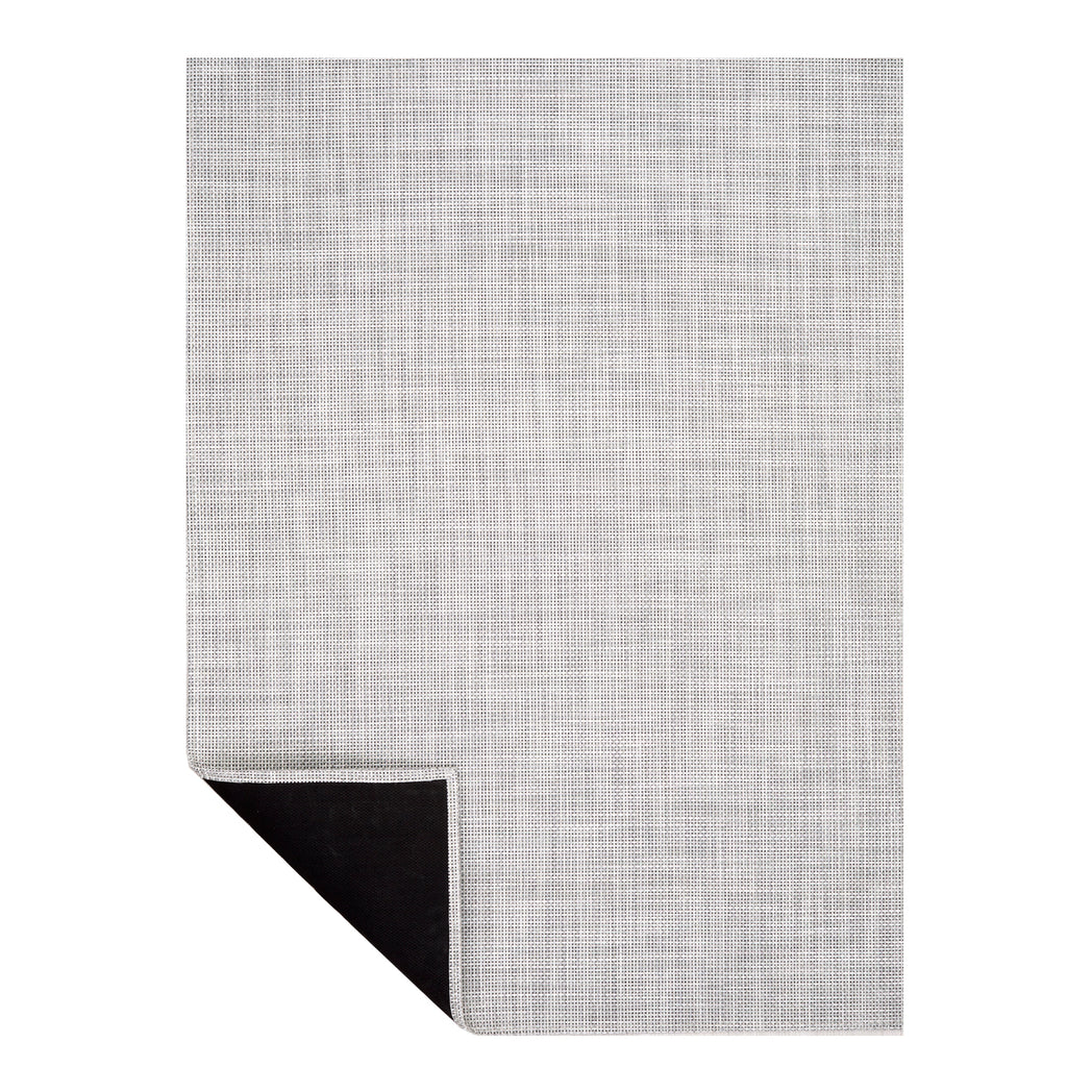 Chilewich Basketweave floor mat in marble, showcasing woven terrastrand yarn texture and modern design aesthetic.