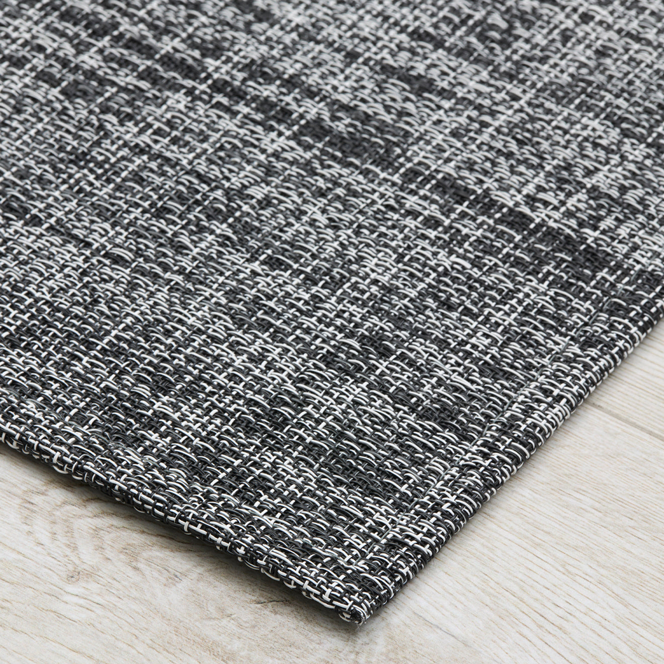 Detail image of Chilewich woven material showcasing texture, color, and pattern of the terrastrand yarn weave.