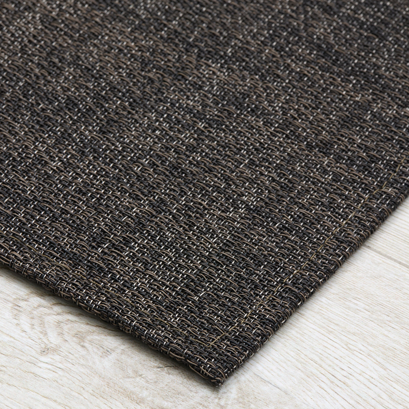 Detail image of Chilewich woven material showcasing texture, color, and pattern of the terrastrand yarn weave.