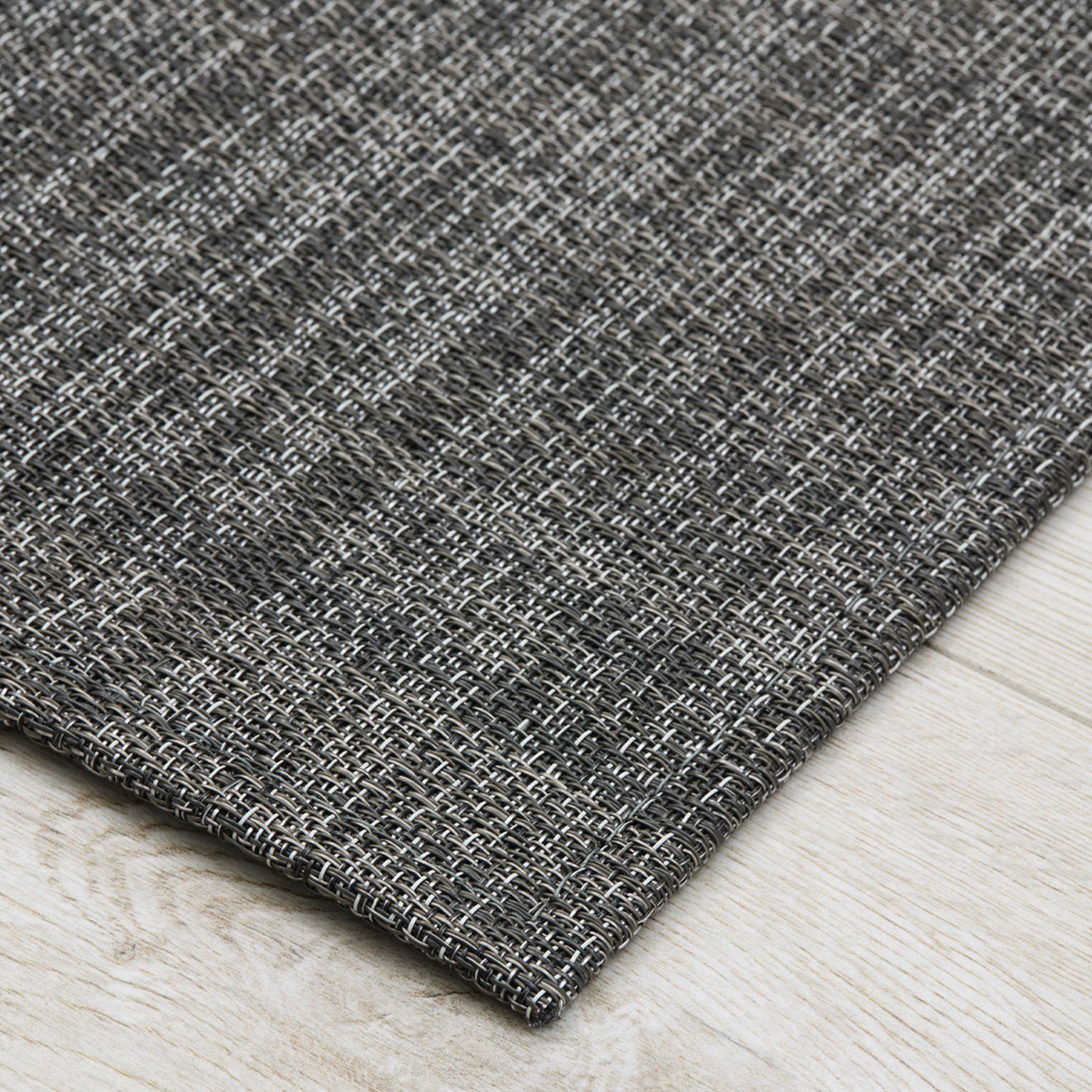 Detail image of Chilewich woven material showcasing texture, color, and pattern of the terrastrand yarn weave.