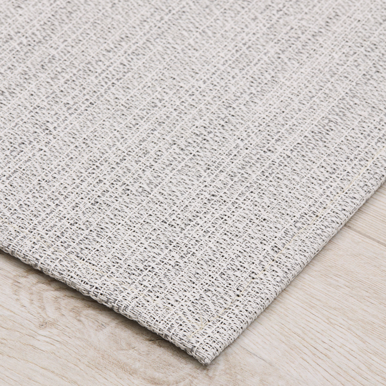 Detail image of Chilewich woven material showcasing texture, color, and pattern of the terrastrand yarn weave.