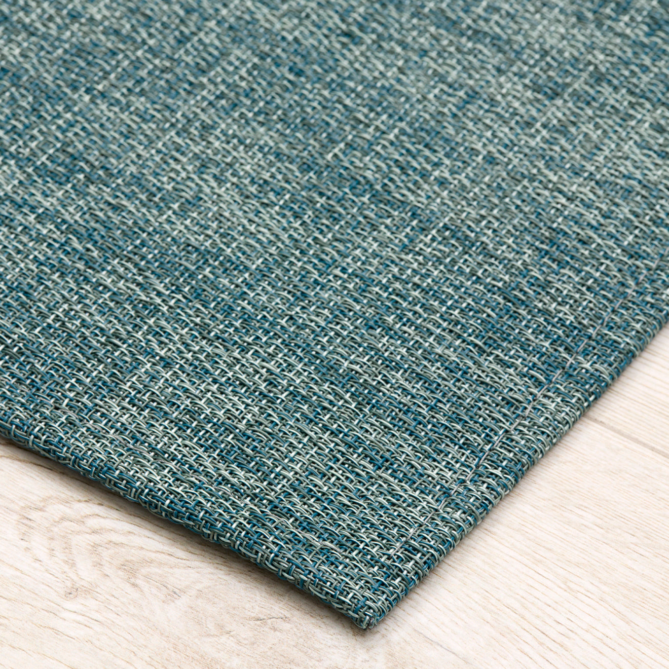 Detail image of Chilewich woven material showcasing texture, color, and pattern of the terrastrand yarn weave.