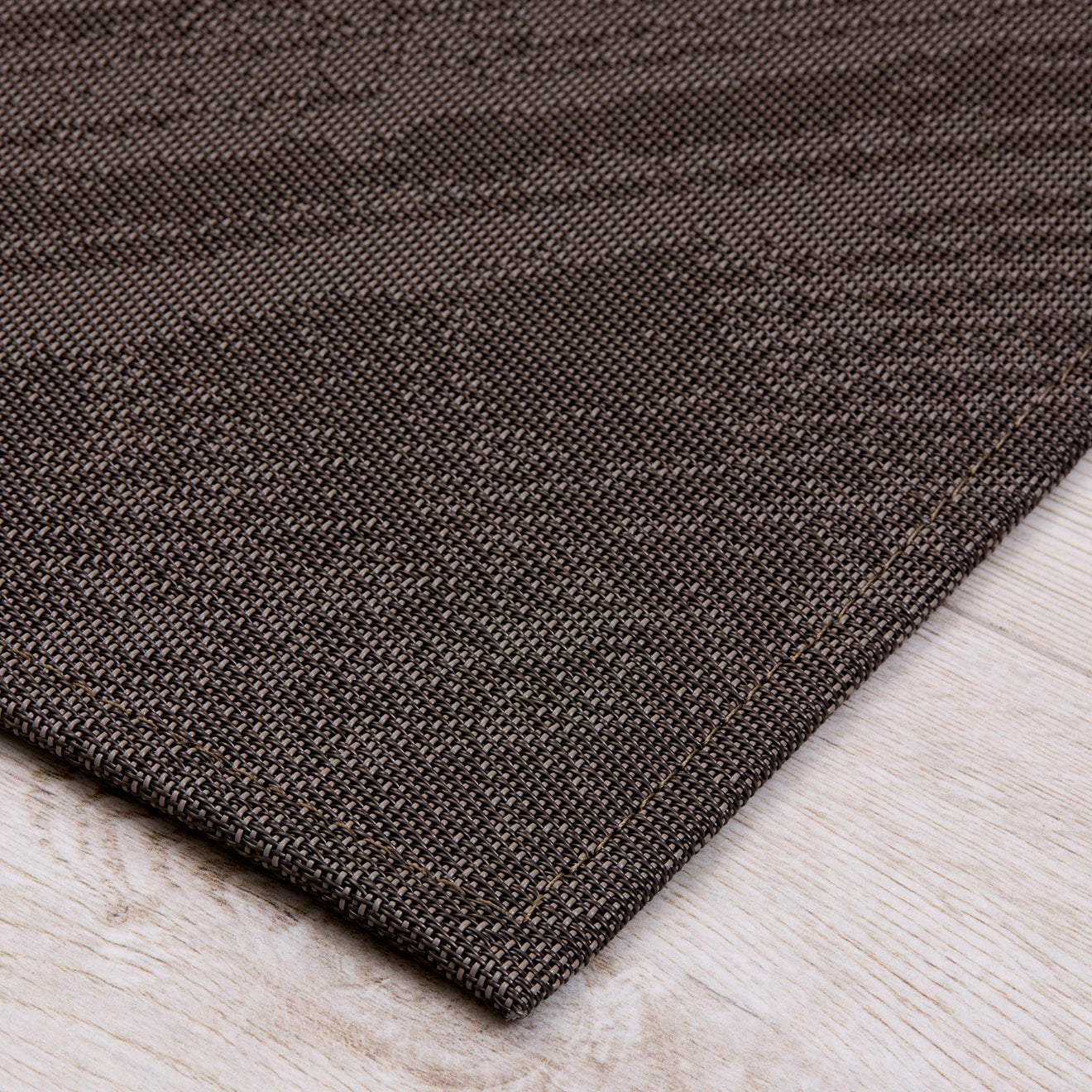 Detail image of Chilewich woven material showcasing texture, color, and pattern of the terrastrand yarn weave.