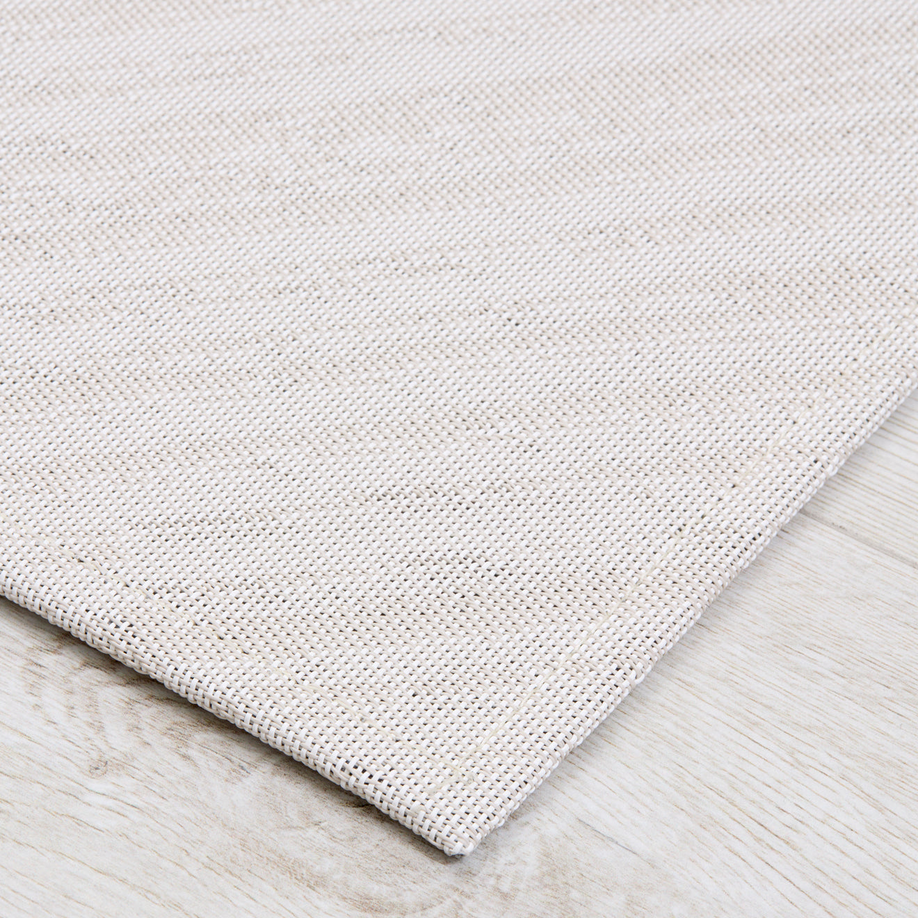 Detail image of Chilewich woven material showcasing texture, color, and pattern of the terrastrand yarn weave.