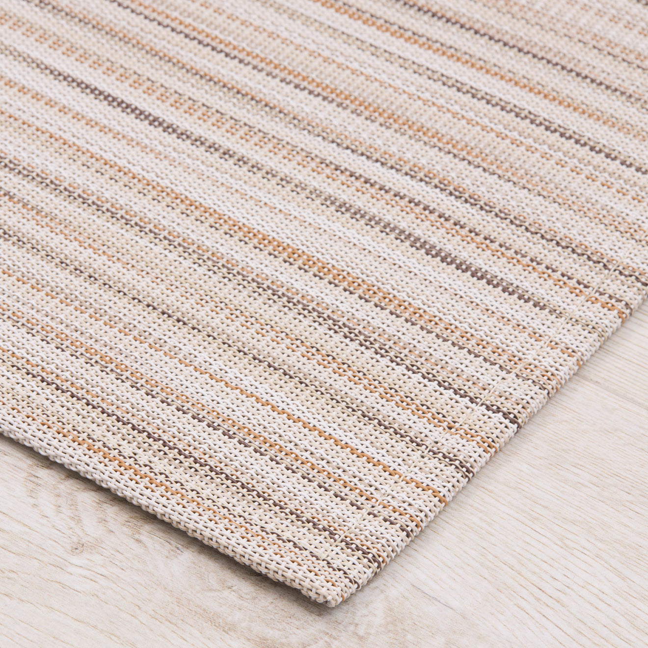 Detail image of Chilewich woven material showcasing texture, color, and pattern of the terrastrand yarn weave.