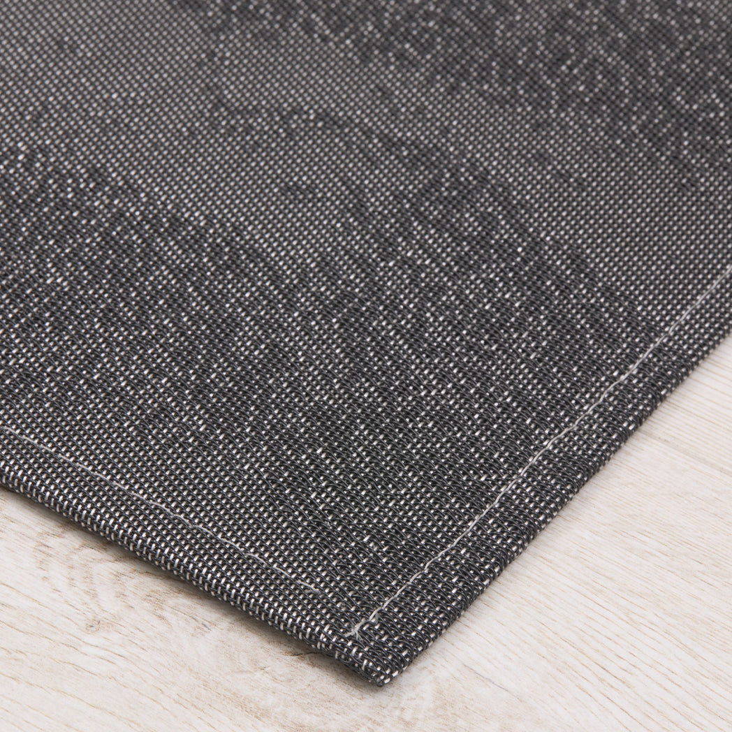 Detail image of Chilewich woven material showcasing texture, color, and pattern of the terrastrand yarn weave.