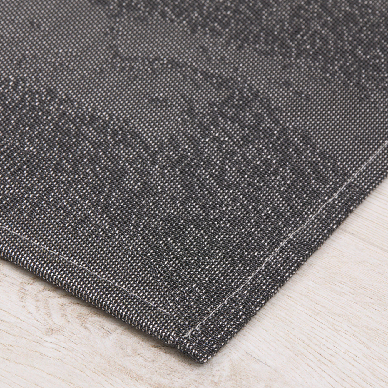 Detail image of Chilewich woven material showcasing texture, color, and pattern of the terrastrand yarn weave.