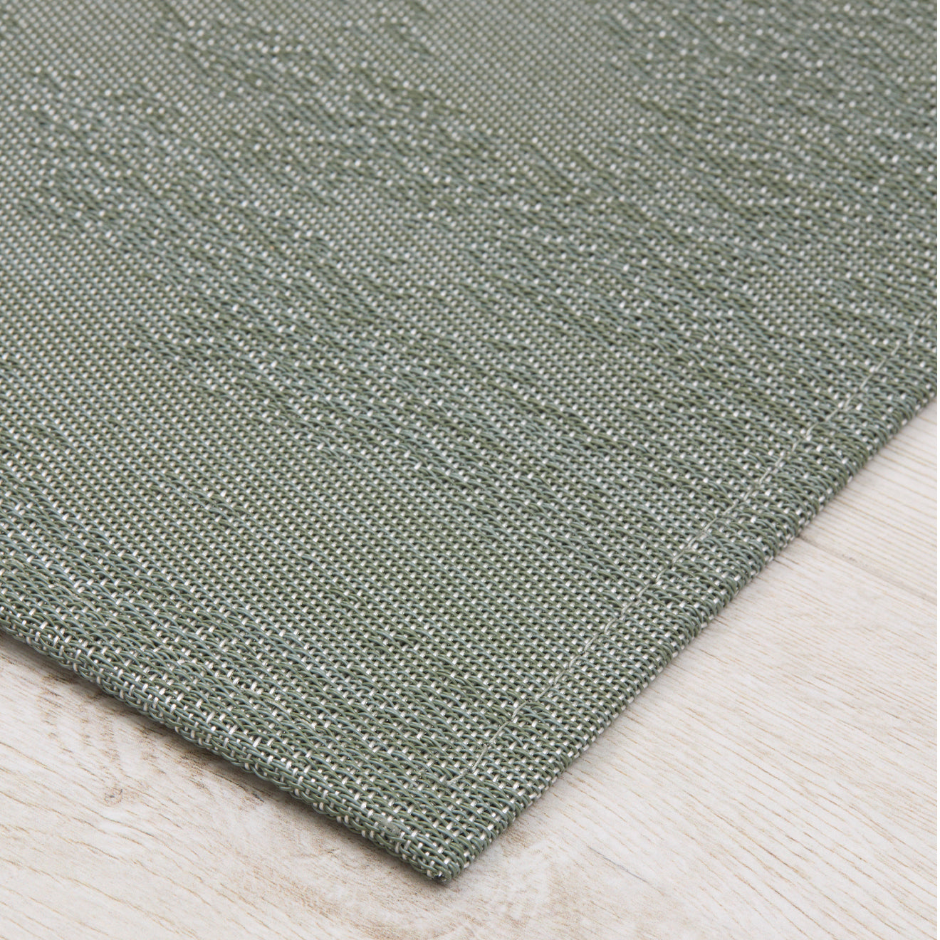 Detail image of Chilewich woven material showcasing texture, color, and pattern of the terrastrand yarn weave.