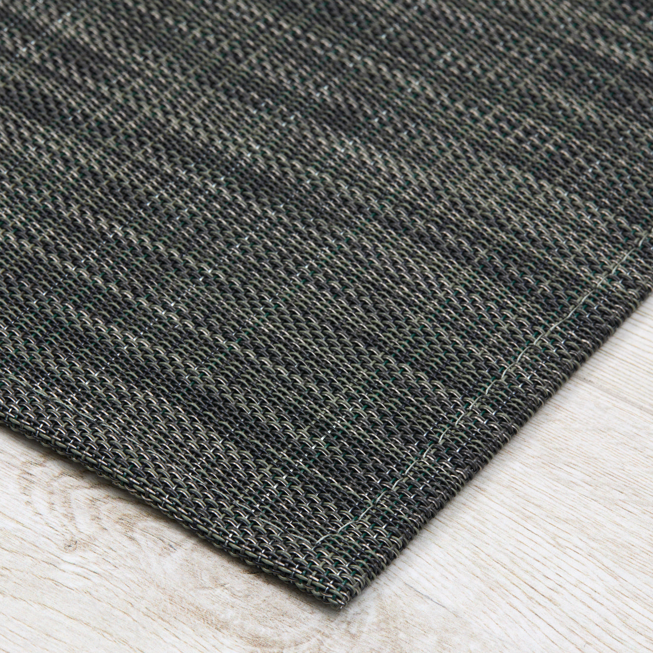 Detail image of Chilewich woven material showcasing texture, color, and pattern of the terrastrand yarn weave.