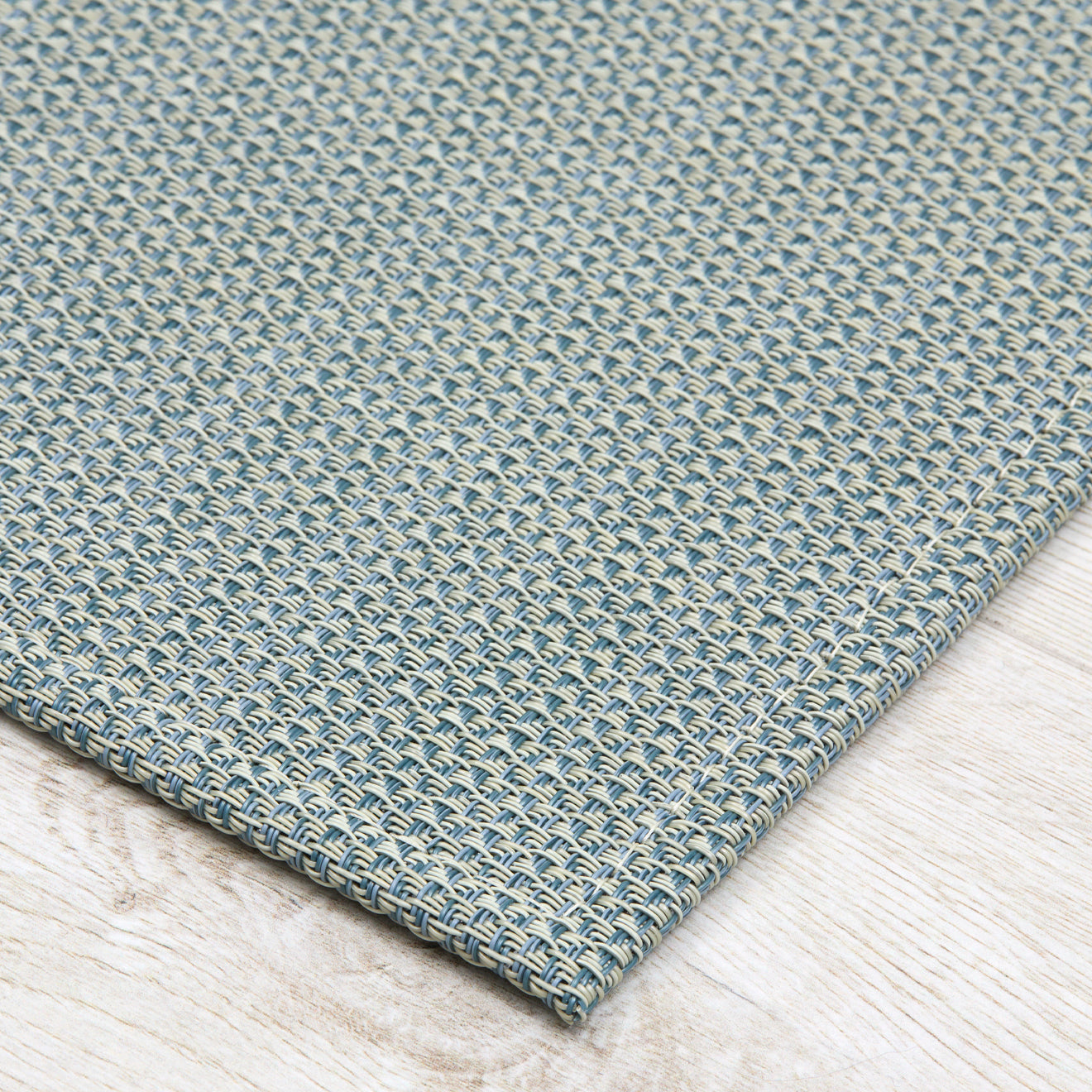 Detail image of Chilewich woven material showcasing texture, color, and pattern of the terrastrand yarn weave.