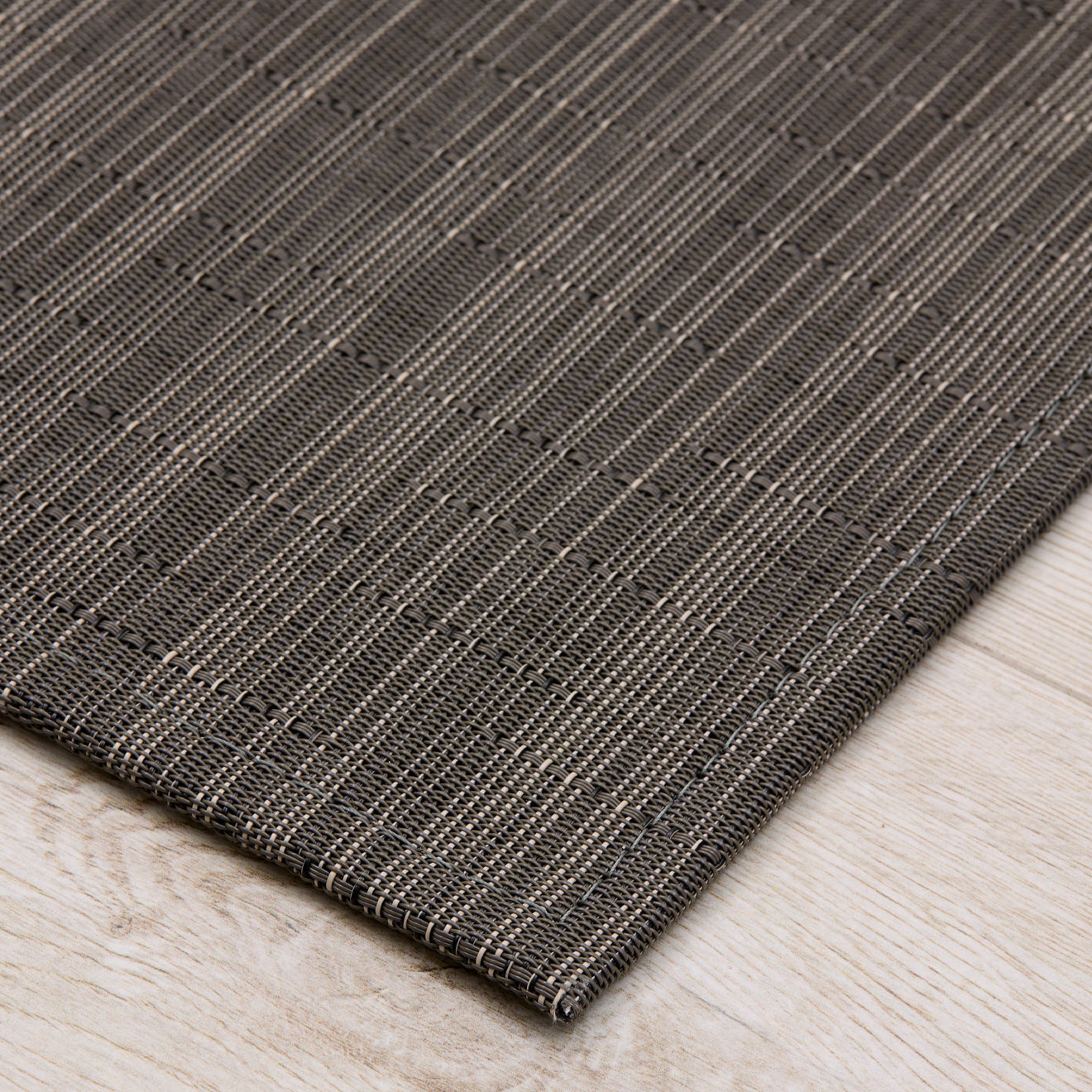 Detail image of Chilewich woven material showcasing texture, color, and pattern of the terrastrand yarn weave.