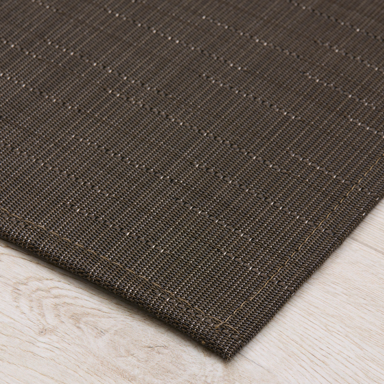 Detail image of Chilewich woven material showcasing texture, color, and pattern of the terrastrand yarn weave.