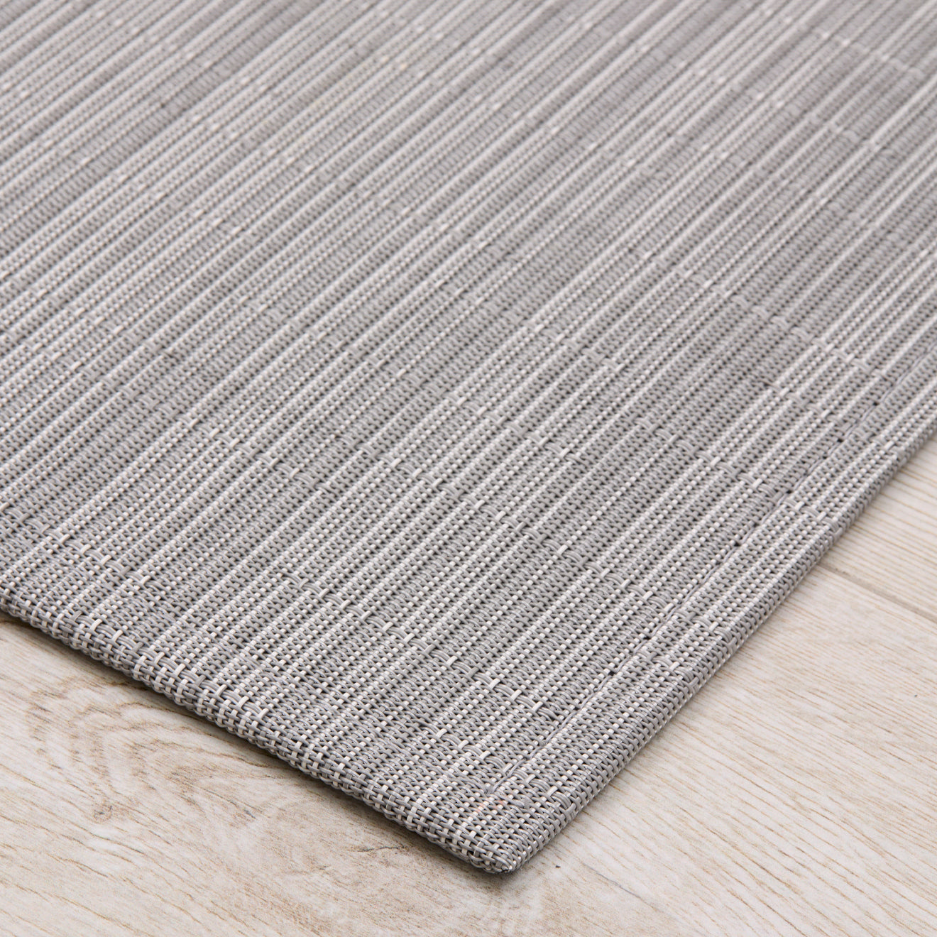 Detail image of Chilewich woven material showcasing texture, color, and pattern of the terrastrand yarn weave.