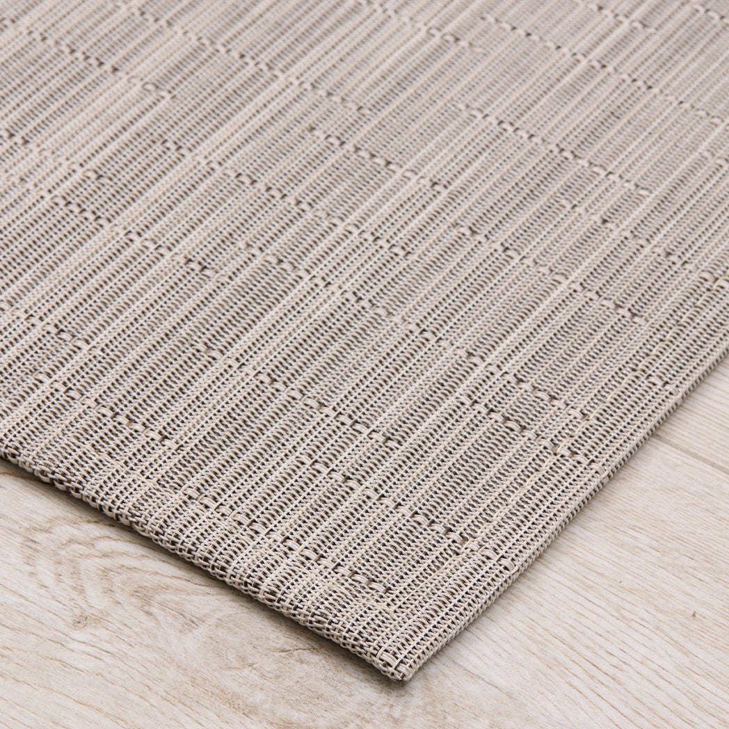 Detail image of Chilewich woven material showcasing texture, color, and pattern of the terrastrand yarn weave.