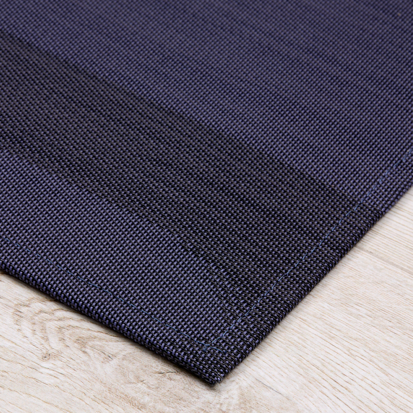 Detail image of Chilewich woven material showcasing texture, color, and pattern of the terrastrand yarn weave.