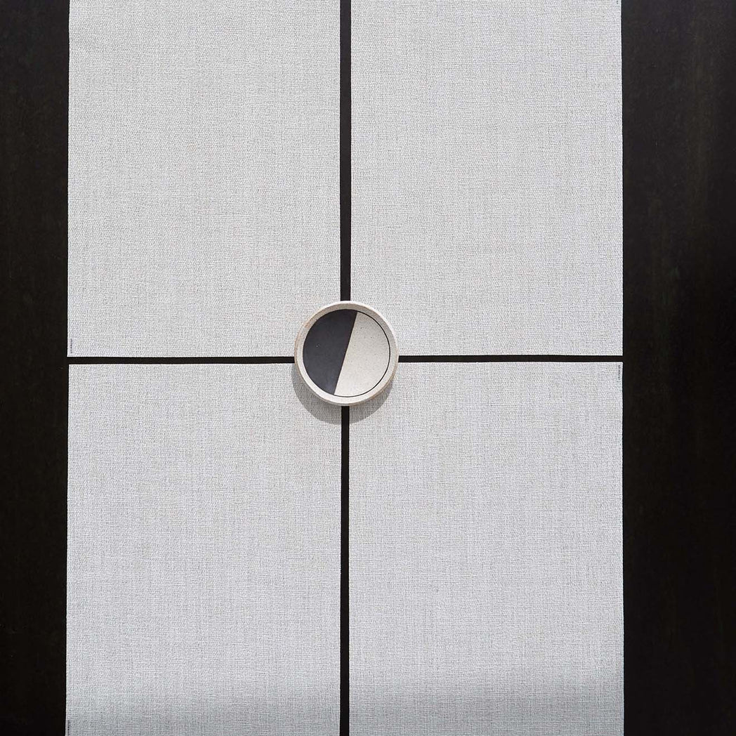 Detail image of Chilewich woven material showcasing texture, color, and pattern of the terrastrand yarn weave.