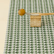 Detail image of Chilewich woven material showcasing texture, color, and pattern of the terrastrand yarn weave.