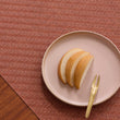 Detail image of Chilewich woven material showcasing texture, color, and pattern of the terrastrand yarn weave.