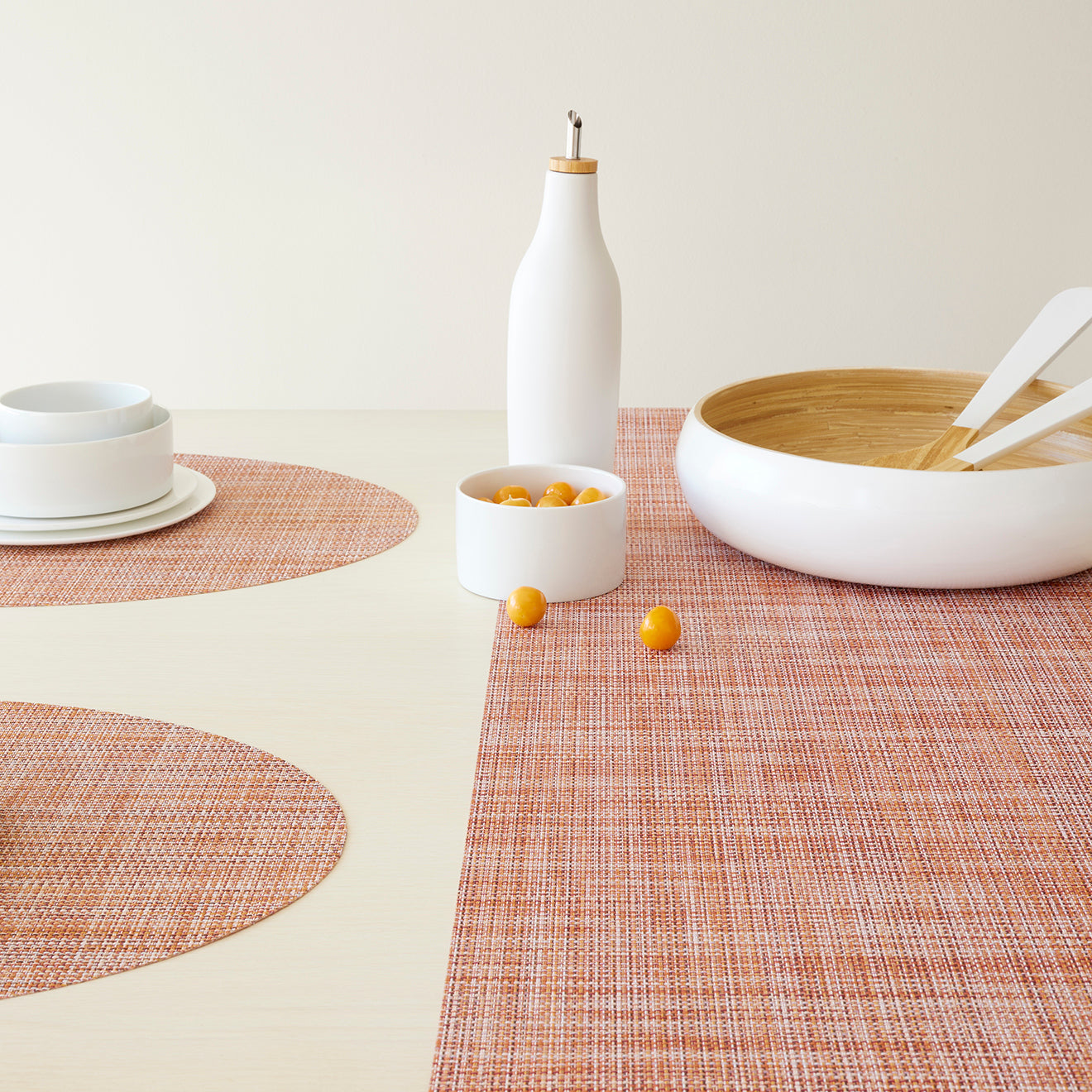 Chilewich Basketweave floor mat in cinnamon, showcasing woven terrastrand yarn texture and modern design aesthetic.