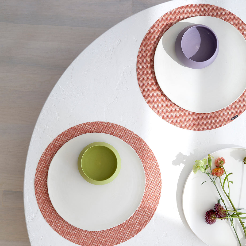 Chilewich Basketweave floor mat in clay, showcasing woven terrastrand yarn texture and modern design aesthetic.