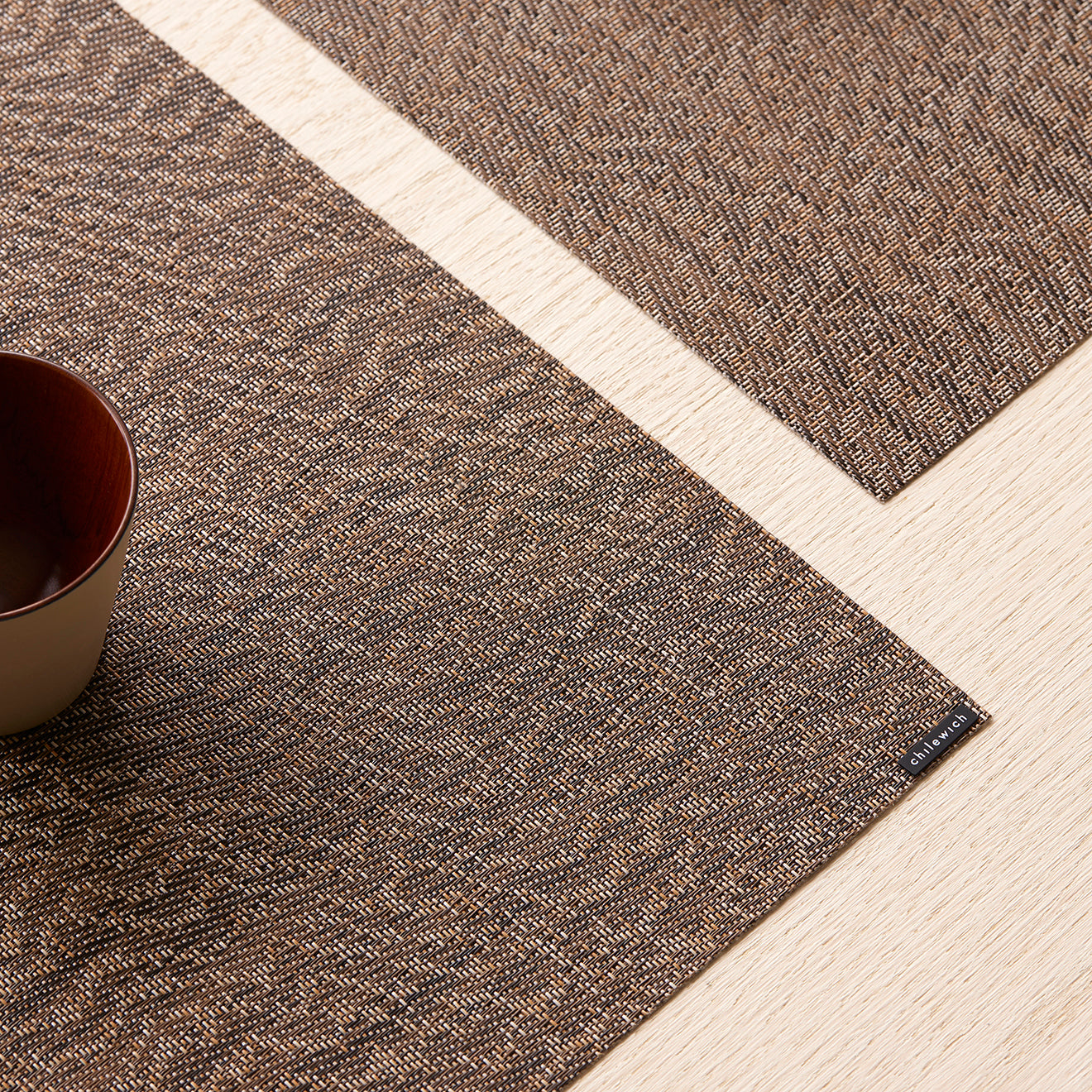 Detail image of Chilewich woven material showcasing texture, color, and pattern of the terrastrand yarn weave.