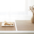Detail image of Chilewich woven material showcasing texture, color, and pattern of the terrastrand yarn weave.