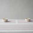 Detail image of Chilewich woven material showcasing texture, color, and pattern of the terrastrand yarn weave.