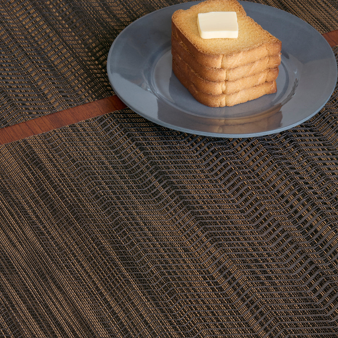 Detail image of Chilewich woven material showcasing texture, color, and pattern of the terrastrand yarn weave.