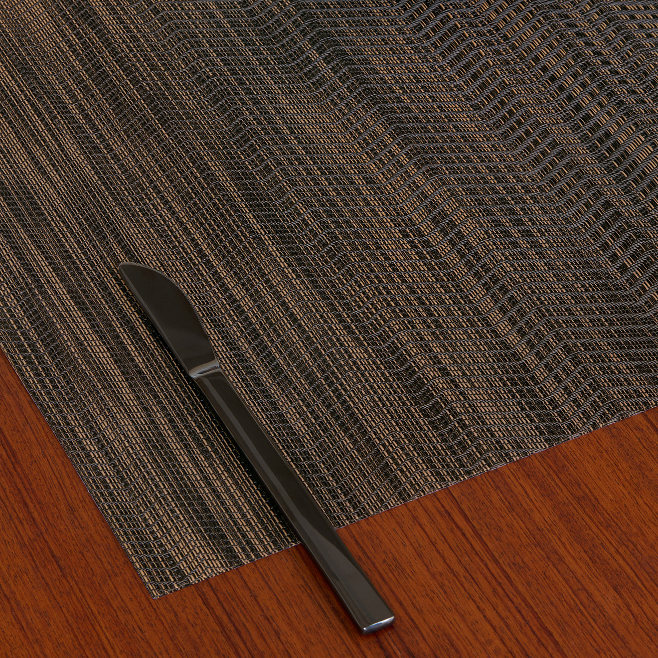 Detail image of Chilewich woven material showcasing texture, color, and pattern of the terrastrand yarn weave.